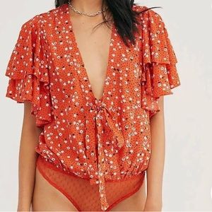 Free People Call Me Later Floral
Ruffle Printed Bodysuit
